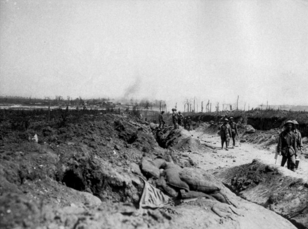The road to Pozieres and Allied troops are making their way through the mud to the village