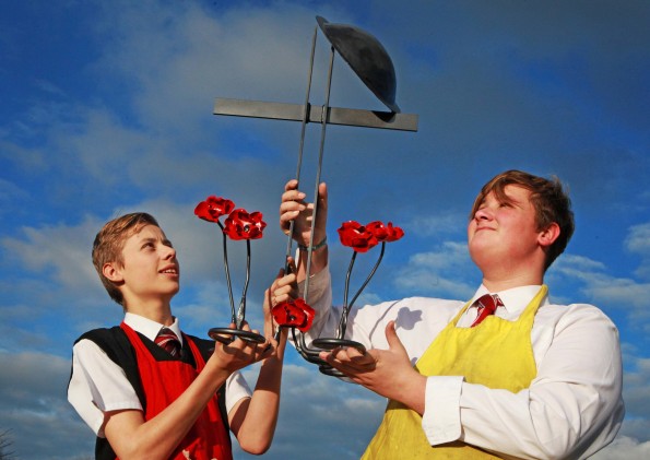 MEMORIAL MASTERS: Liam Smart and John James Perangie with the memorial sculpture they made