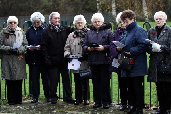 REMEMBRANCE SERVICE: People gather to remember the fallen at the War Memorial at Smith’s Dock Park, Normanby, during a remembrance service. Picture: TOM BANKS