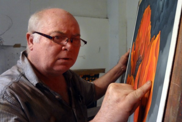 MASTER CLASS: Artist Mackenzie Thorpe at work on the poppy