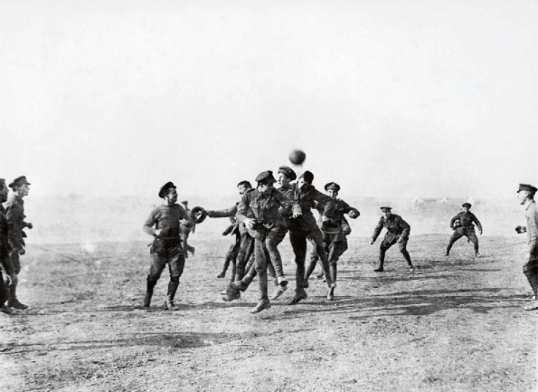GAME ON: Soldiers pictured playing in the iconic Christmas Day football match on the Western Front in 1914