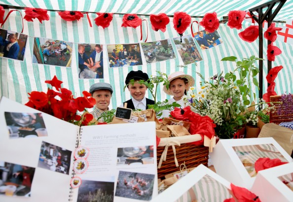 STALLS: Children from local schools set up WW1 food stalls in Durham Market Place as part of Durham Farmers' Market Pictured Jackson Stevenson, Regan Bowman, and Robyn Pipe, from Easington Colliery Primary School. Picture: SARAH CALDECOTT