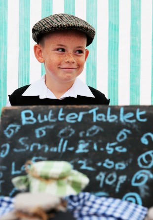STALLS: Children from local schools set up WW1 food stalls in Durham Market Place as part of Durham Farmers' Market. Picture: SARAH CALDECOTT