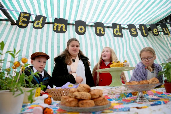 STALLS: Children from local schools set up WW1 food stalls in Durham Market Place as part of Durham Farmers' Market. Picture: SARAH CALDECOTT