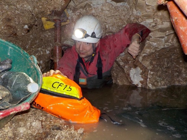 DISCOVERY: Search and rescue volunteer Paul Allison in one of the collapsed tunnels