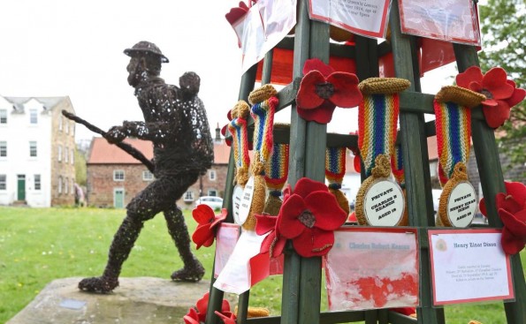 The knitted medals near the wicker sculpture of the WWI soldier at Great Ayton. Picture: RICHARD DOUGHTY PHOTOGRAPHY