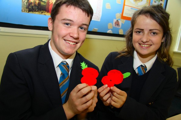 St Michael’s Academy pupils Lennon Legg, 14 and Megan Sinclair, 14, both of Billingham, make remembrance poppies