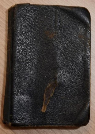 Tommy Crawford's prayer book which stopped a bayonet from being thrust into his chest