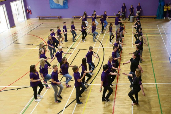 PASSING OUT: Children at St Aidan's Academy in Darlington perform their parade at the end of Make a Difference week