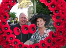 WAR TRIBUTE: Lord Lieutenant Sue Snowdon with Brian Laverick, of the Boundary 500 Motorcycle club, with one of the wreaths. Picture by Keith Taylor