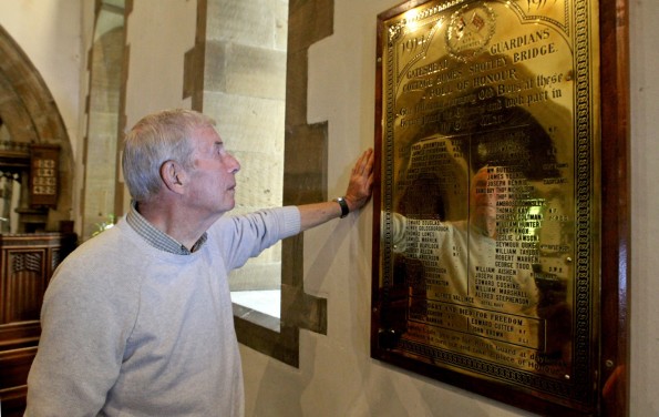 PAYING RESPECT: Jim Clarke with the plaque honouring old boys of the then Gateshead Cottage Homes. The plaque now sits in St Mary Magdalene's Church, Medomsley