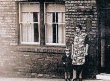 LEFT BEHIND: Eliza and Michael Lowery junior, the son his father never saw, outside their home in Clarence Street shortly after the end of the war